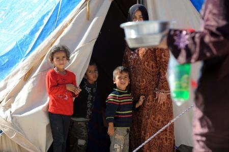 قصة مصورة : مخاوف وآمال في مخيم للاجئين السوريين