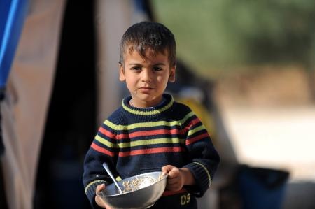 قصة مصورة : مخاوف وآمال في مخيم للاجئين السوريين