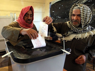 قصة مصورة .. الاخوان المسلمين : 64% من المشاركين في الاستفتاء وافقوا على الدستور المصري