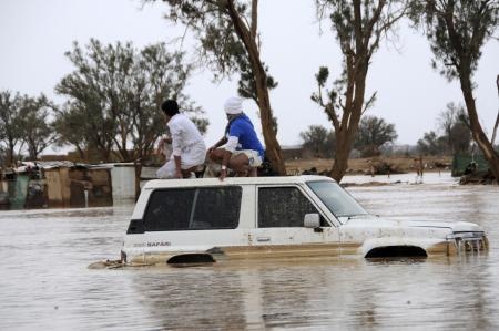 قصة مصورة: أمطار تبوك تغرق  الأحياء السكنية