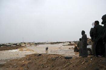 قصة مصورة: أمطار تبوك تغرق  الأحياء السكنية