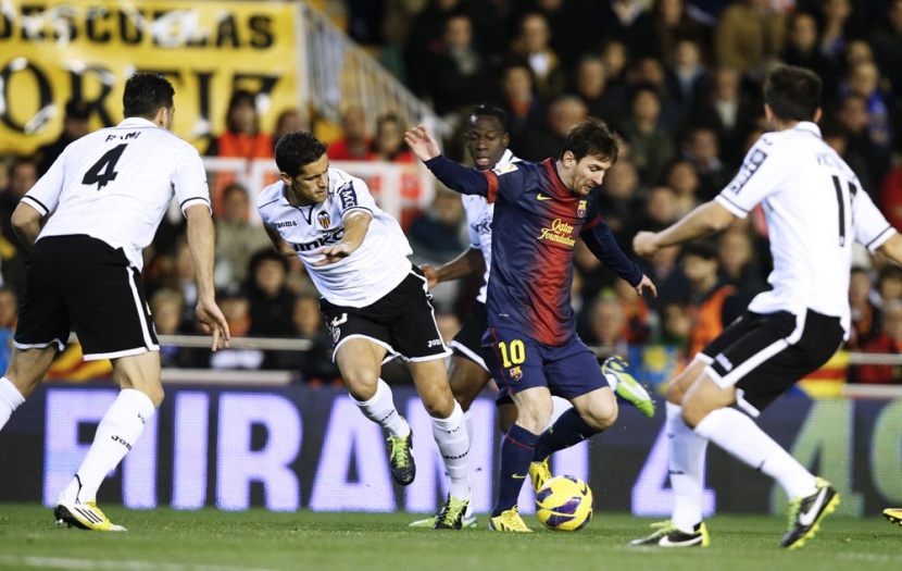 ميسي يساعد برشلونة على التعادل مع بلنسية في الدوري الاسباني