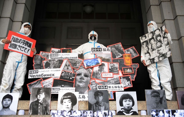 صة مصورة : مناهضون للطاقة النووية في اليابان يحتجون بعد عامين من حادث فوكوشيما