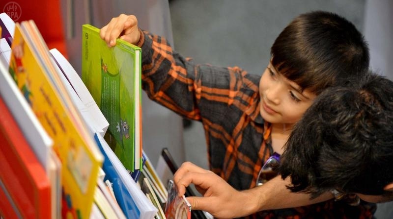 قصة مصورة : فعاليات وورش عمل جناح المرأة والطفل في معرض الكتاب