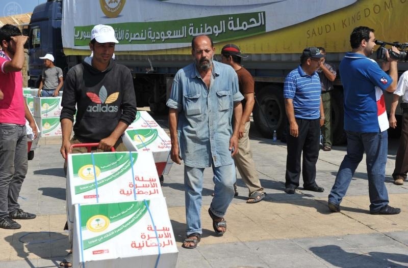 الحملة الوطنية تواصل توزيع السلال الرمضانية على نازحي سوريا