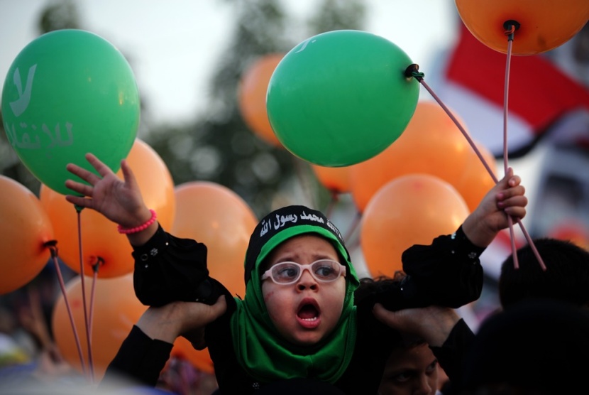 تحقيق: أنصار مرسي ينتظرون "المواجهة" في أجواء احتفالية