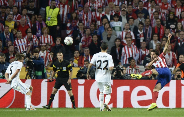 قصة مصورة : ريال مدريد يحقق "العاشرة"