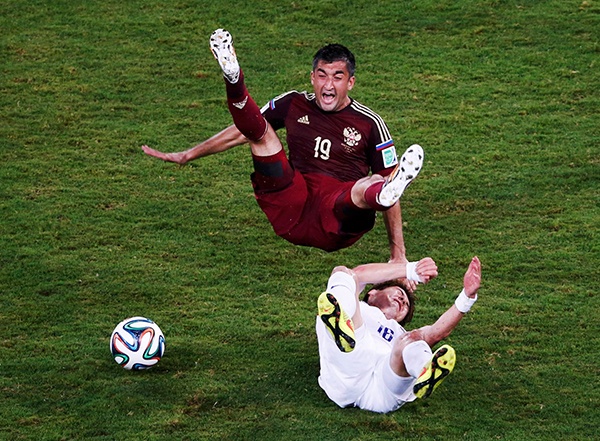 قصة مصورة : تعادل كوريا وروسيا يحرم آسيا من أول انتصار مونديالي