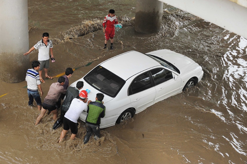 قصة مصورة : فيضانات الصين