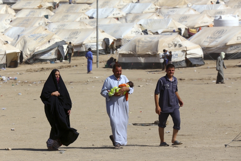 المسيحيون يغادرون الموصل قبيل انتهاء مهلة "الدولة الاسلامية"