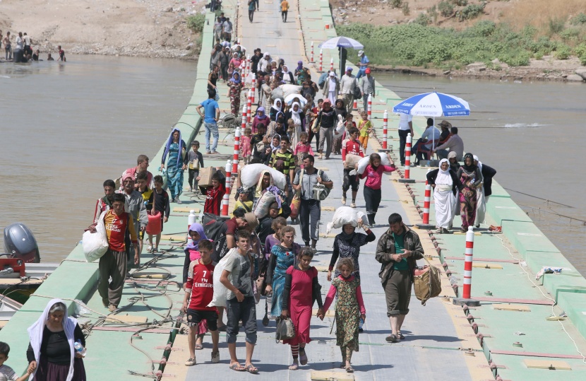 قصة مصورة : نازحون عراقيون أبعدتهم الإضطرابات