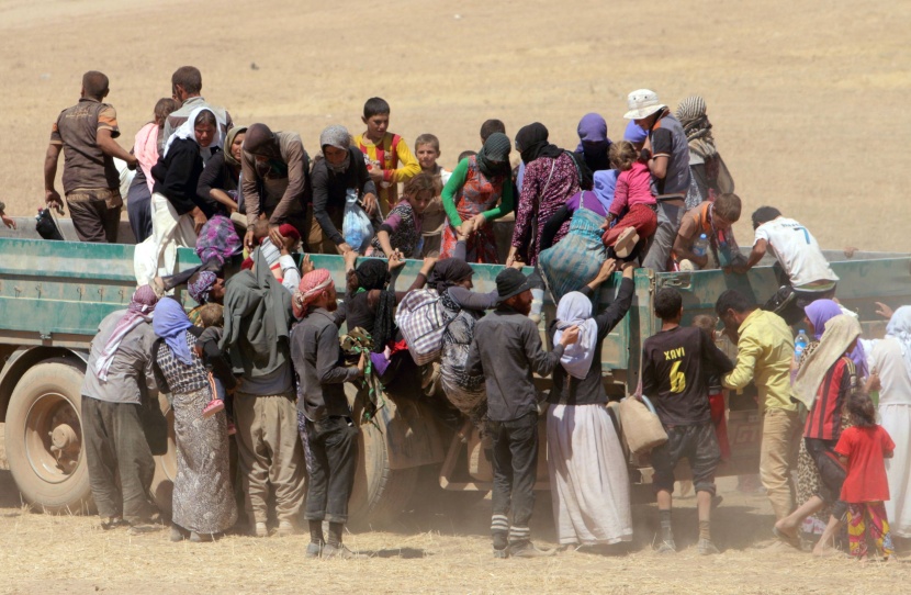 قصة مصورة : نازحون عراقيون أبعدتهم الإضطرابات