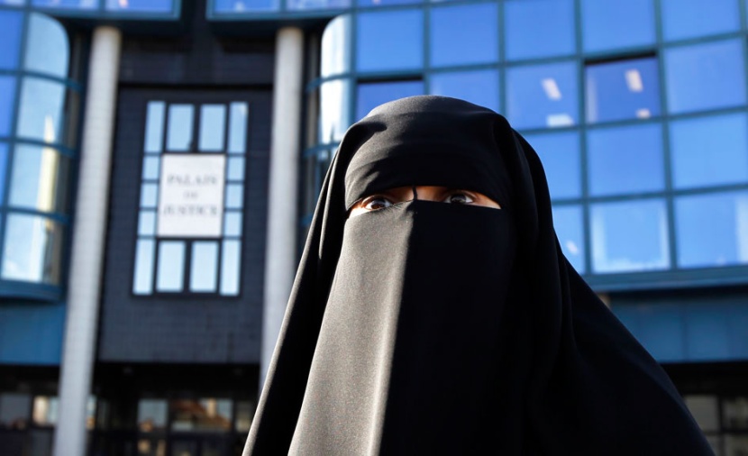 العنف والتهديد يحفزان المسلمات في بريطانيا على ارتداء الحجاب