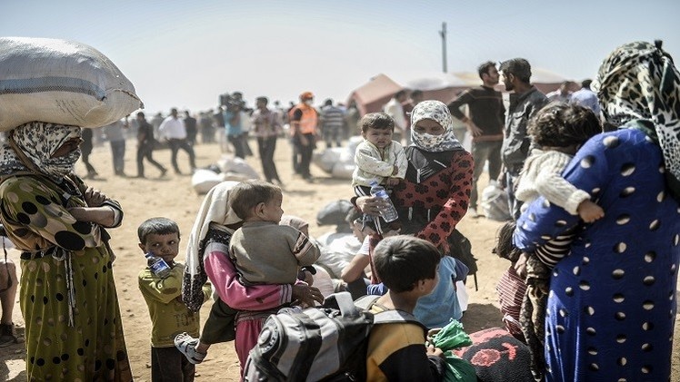 برنامج الأغذية العالمي يضطر إلى خفض مساعداته للاجئين السوريين