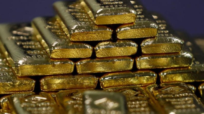 الذهب يغلق مرتفعا لكنه يسجل أطول سلسلة خسائر شهرية في عقدين