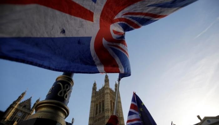 بريطانيا وسويسرا توقعان إتفاقية لاستمرار التعاون التجاري عقب "بريكست"