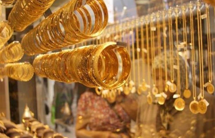 الذهب ينزل عن ذروة شهر بفعل آمال محادثات التجارة الأمريكية الصينية