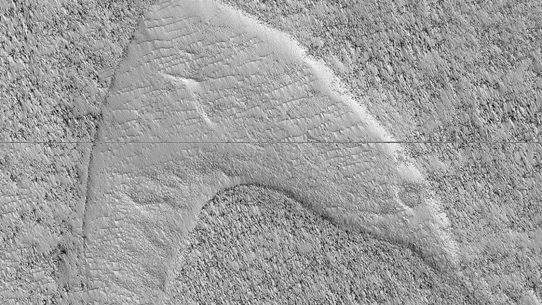 علماء أمريكيون يكتشفون رسما غريبا على سطح المريخ