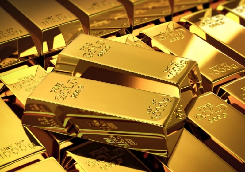 الذهب ينخفض مع صعود الدولار والأنظار على محادثات التجارة