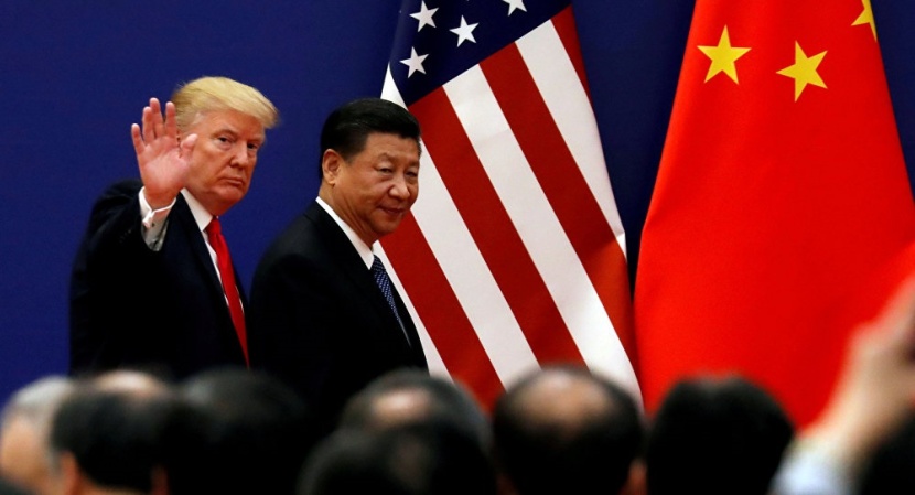 الصين : الرئيس الأمريكي يضلل الشعب بربطه اتفاق التجارة وتباطؤ الاقتصاد
