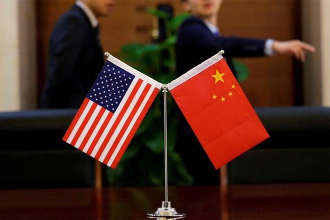 اتصال هاتفي بين أمريكا والصين يعيد الحرب التجارية إلى الطاولة