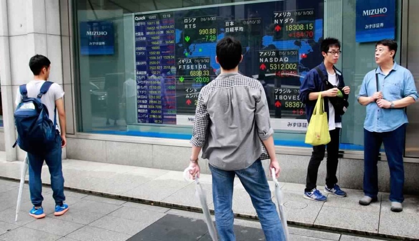 خسائر قطاع التكنولوجيا ومخاوف محادثات التجارة تهبط بأسهم اليابان