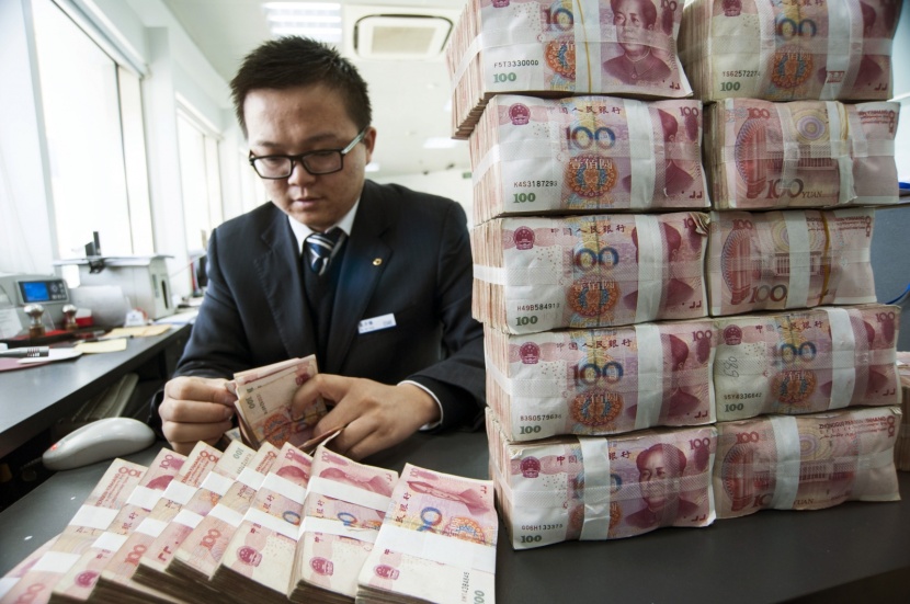 الصين تحفز تباطؤ اقتصادها بتسييل 114.9 مليار دولار في المصارف 