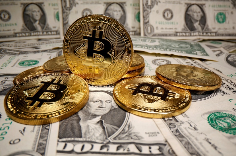 بيتكوين ترتفع 65% هذا العام وتتخطى 70 ألف دولار 