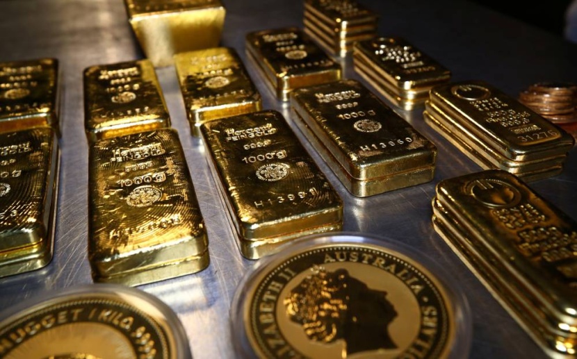 الذهب يواصل ارتفاعه القياسي عند 2335 دولار وسط عمليات مضاربة 