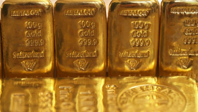 الأمريكيون يجنون أرباح الذهب والآسيويون يواصلون الشراء