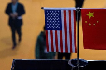 الصين تقر بأن الاتفاق التجاري مع أمريكا تأثر بكورونا
