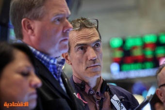 الأسهم الأمريكية تغلق على انخفاض طفيف بعد صدور محضر الفيدرالي